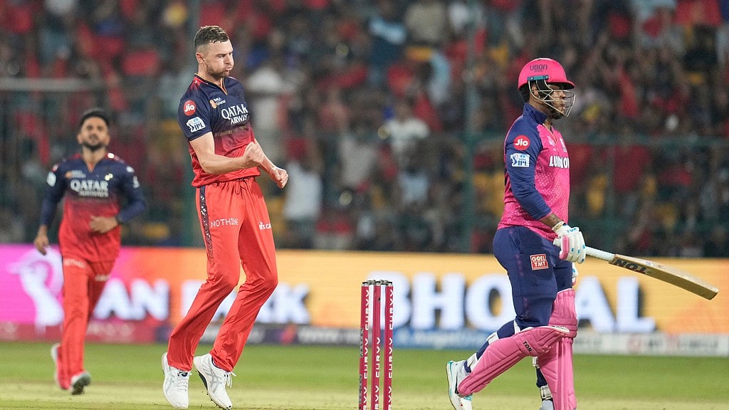 AP/Aijaz Rahi : Josh Hazlewood celebrates.