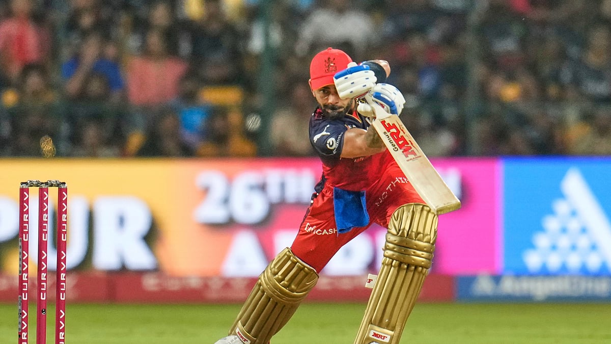 AP Photo/Aijaz Rahi : Royal Challengers Bengaluru's Virat Kohli plays a shot during the Indian Premier League cricket match between Royal Challengers Bengaluru and Rajasthan Royals at Chinnaswamy Stadium in Bengaluru.