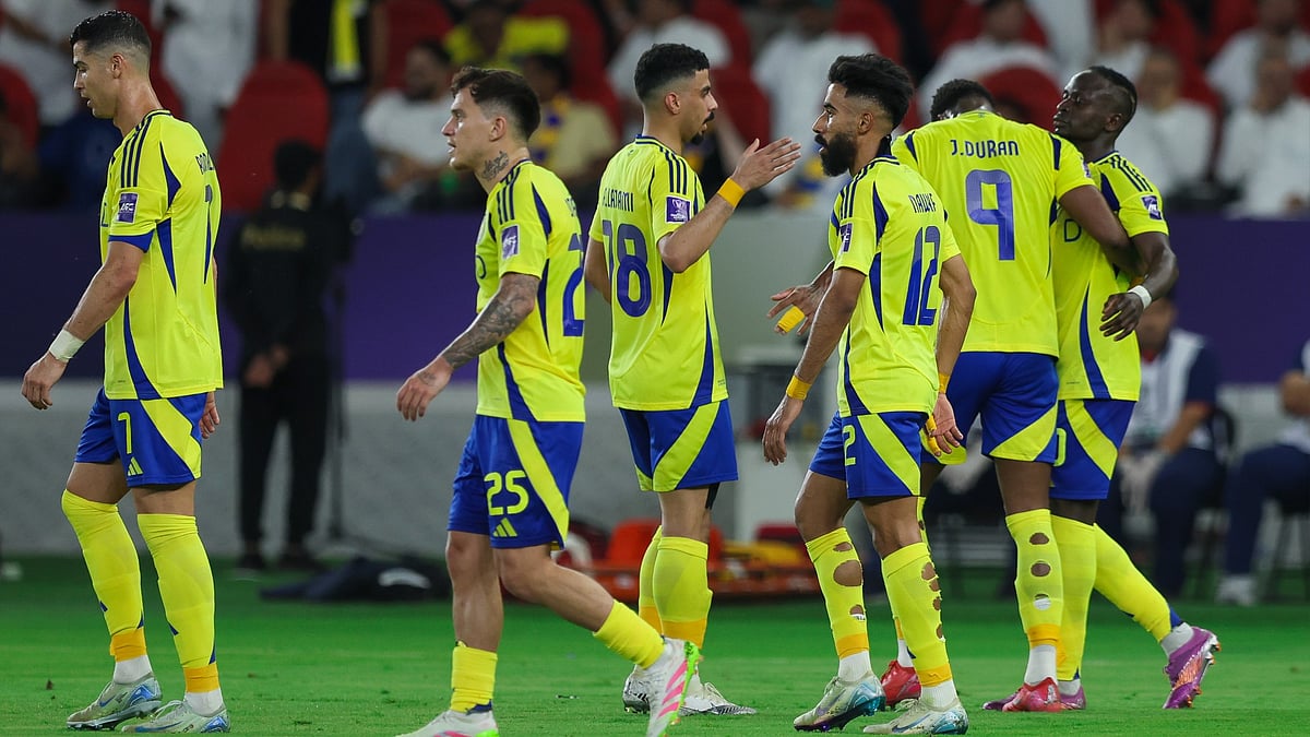 Al-Nassr celebrate their third goal.