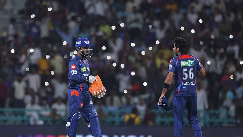 Lucknow Super Giants captain Rishabh Pant, left, gestures with Ravi Bishnoi. AP