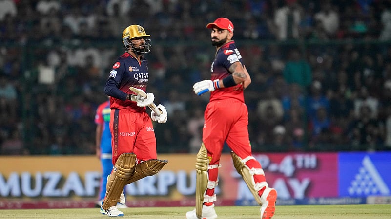 Royal Challengers Bengalurus Virat Kohli, right, and batting partner. AP