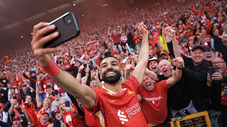 Salah celebrates with Liverpool's fans - null