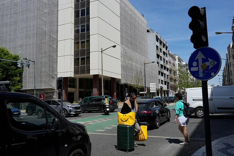 Traffic lights stopped working following a power outage in downtown Lisbon, Portugal, Monday, April 28, 2025 - AP Photo/Armando Franca