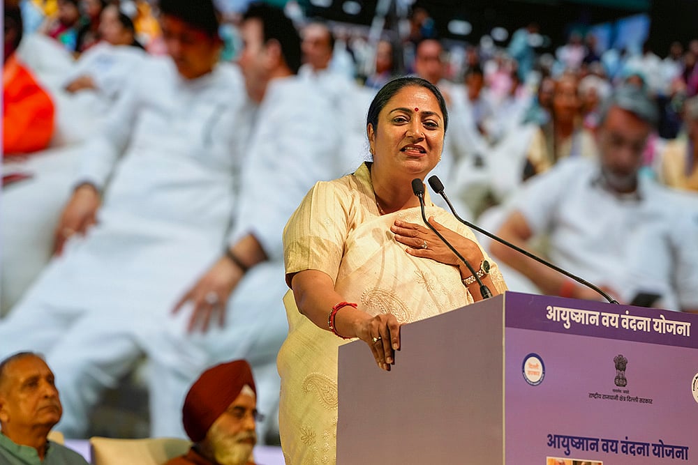 | Photo: PTI/Atul Yadav : Delhi govt hands out health cards to senior citizens
