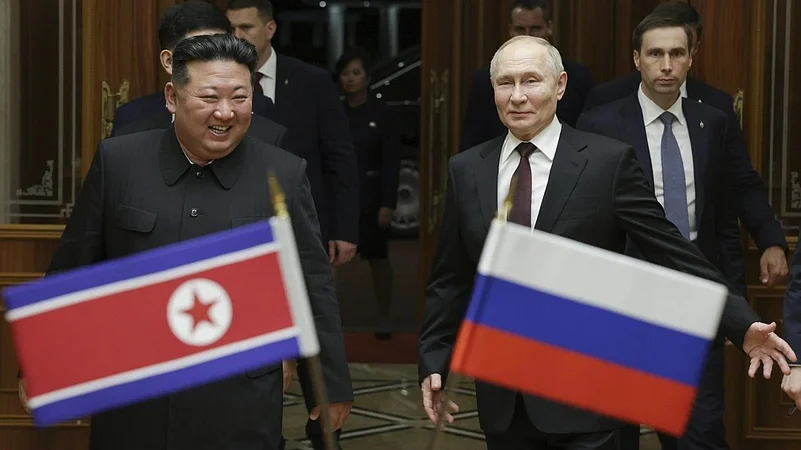 Vladimir Putin (R), Kim Jong Un (L)