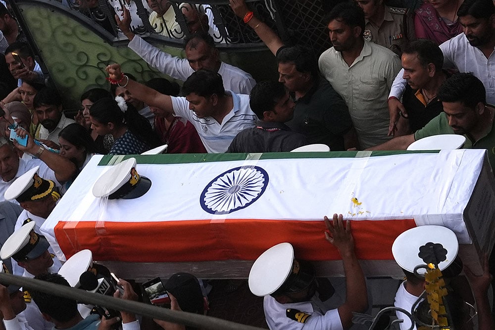 People carrying Indian Navy officer Lieutenant Vinay Narwal