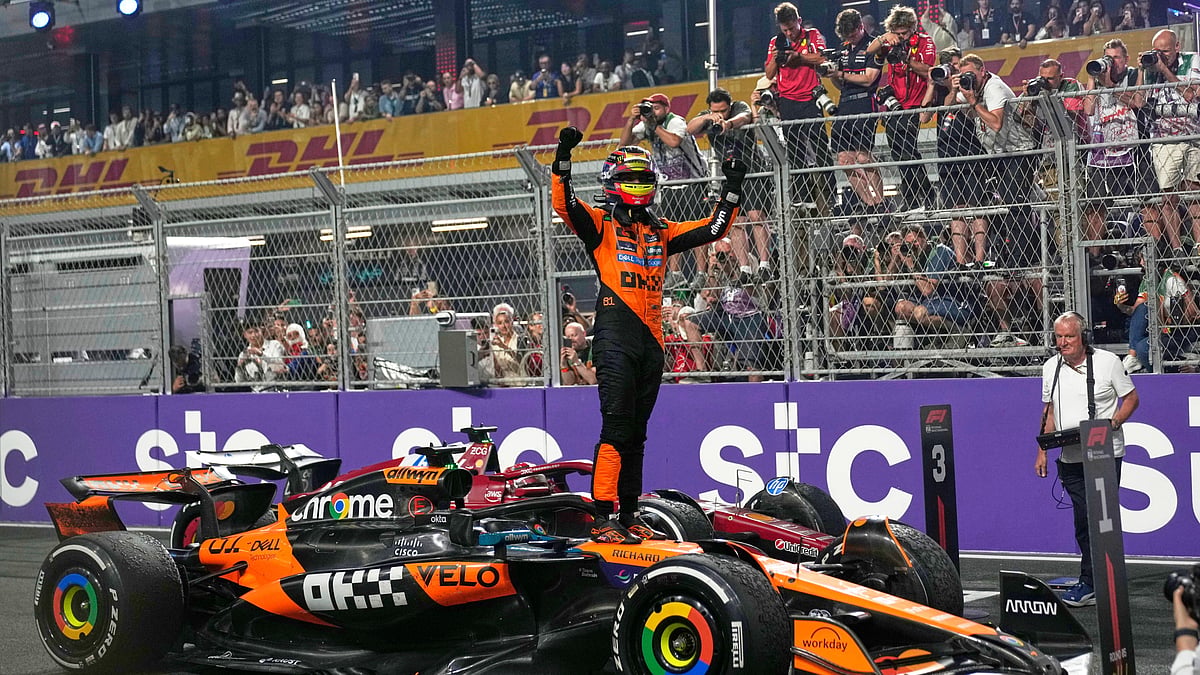  (AP Photo/Altaf Qadri) : McLaren driver Oscar Piastri of Australia celebrates after winning the Formula One Saudi Arabian Grand Prix at the Jeddah Corniche Circuit in Jeddah, Saudi Arabia, Sunday, April 20, 2025.

