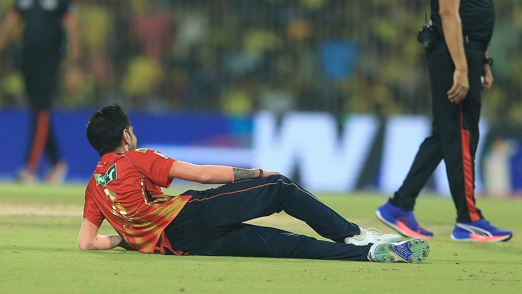 AP : Punjab Kings' Yuzvendra Chahal celebrates after taking a hat-trick during the Indian Premier League match against Chennai Super Kings.