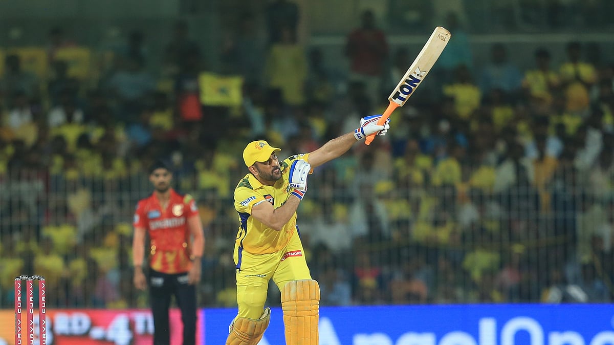 AP Photo/R. Parthibhan : Chennai Super Kings' Mahendra Singh Dhoni plays a shot during the Indian Premier League cricket match at M. A. Chidambaram Stadium in Chennai.