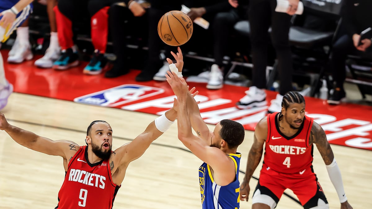 Dillon Brooks of the Houston Rockets defends Golden State warriors' Steph Curry