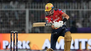 AP Photo/Bikas Das : Punjab Kings' Marco Jansen plays a shot during the Indian Premier League cricket match at Eden Gardens in Kolkata in Kolkata.