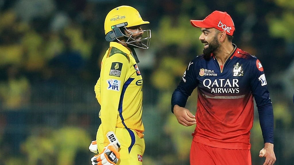 AP/R. Parthibhan : Royal Challengers Bengaluru's Virat Kohli, right, and Chennai Super Kings' Ravindra Jadeja chat.