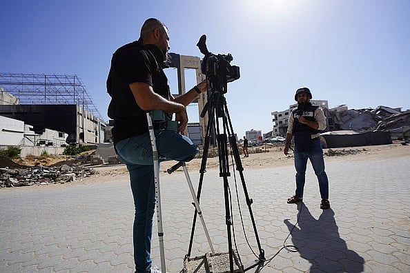 Anas Zeyad Fteha/Anadolu via Getty Images : GAZA CITY, GAZA - MAY 3: Journalists continue to work in Gaza as media professionals around the world celebrate Press Freedom Day on May 3 in Gaza City on May 3, 2025.