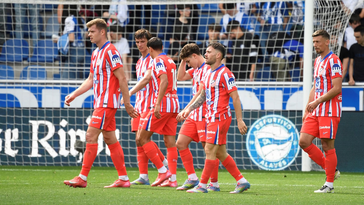 Atletico Madrid's players trudge off after the goalless draw