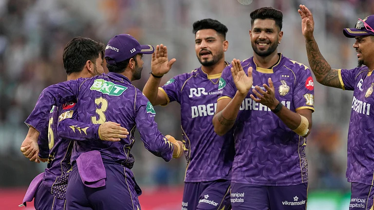 Kolkata Knight Riders' captain Ajinkya Rahane, left, celebrates with teammates after taking the catch to dismiss Rajasthan Royals' Vaibhav Suryavanshi bowled by Vaibhav Arora, second from right, during the Indian Premier League cricket match in Kolkata. - AP Photo/Bikas Das