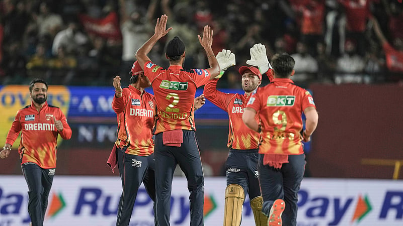 Punjab Kings Arshdeep Singh celebrates the dismissal of Markram. AP