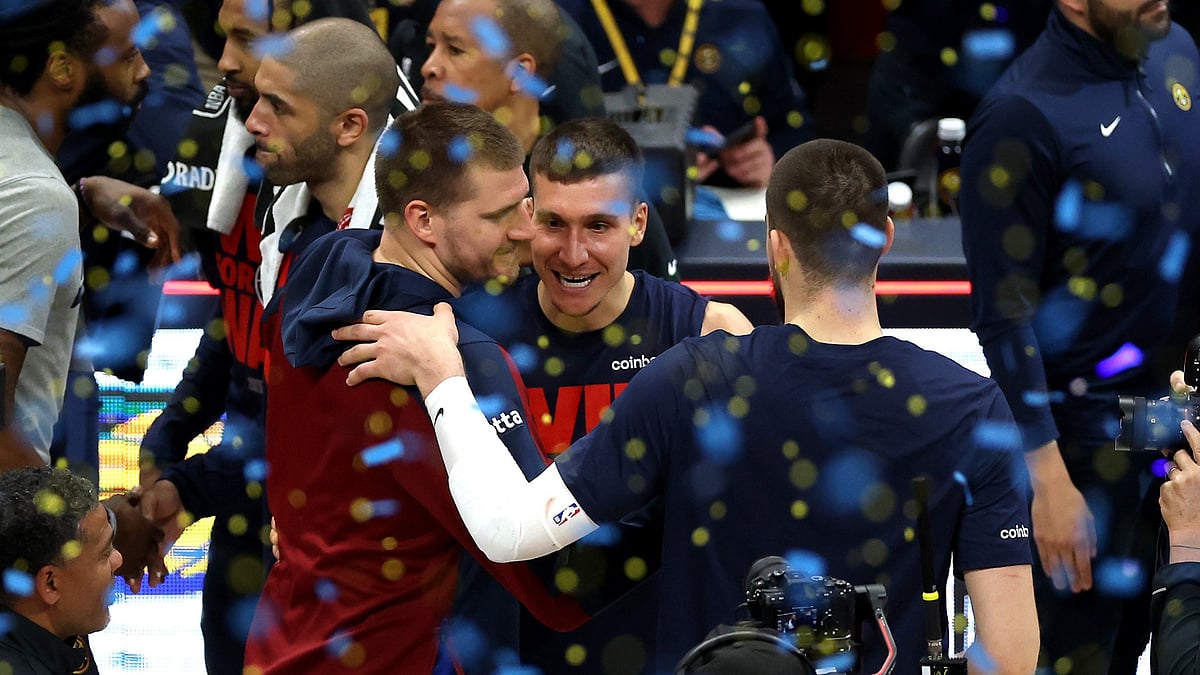Nikola Jokic #15 of the Denver Nuggets celebrates