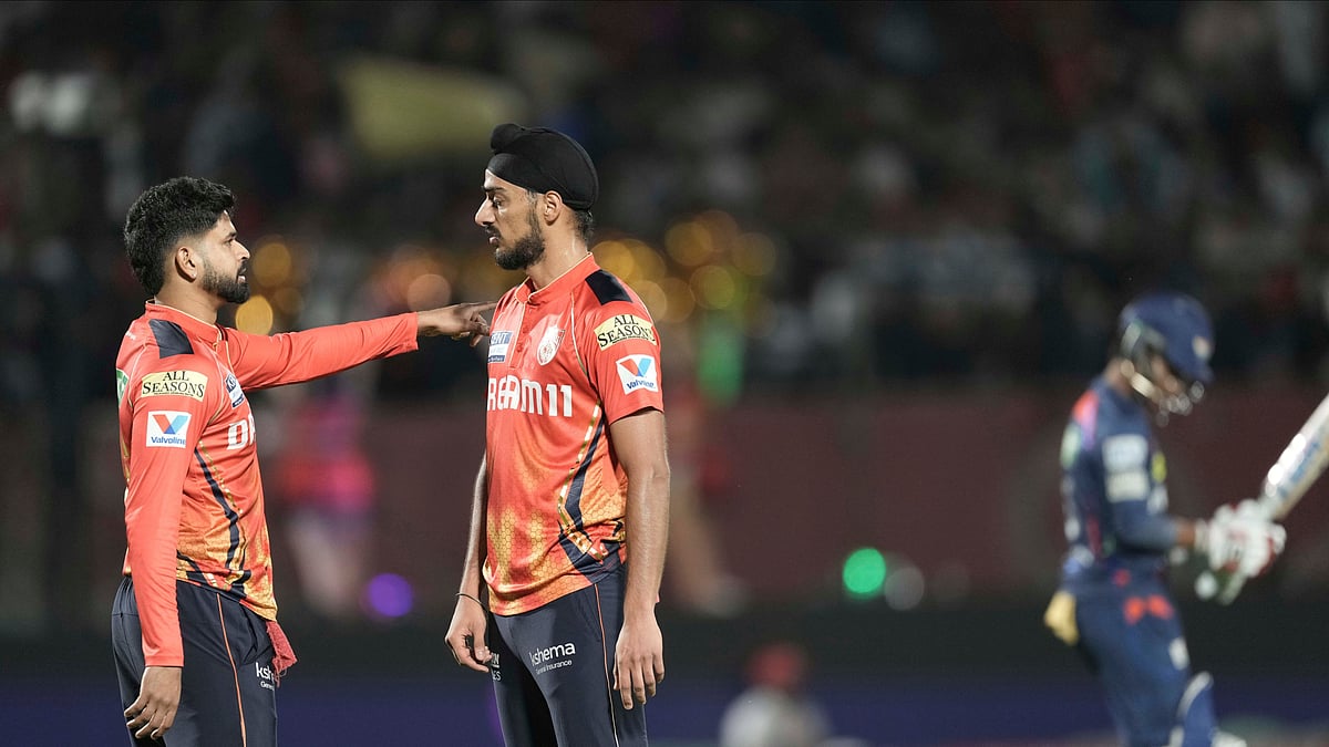 Punjab Kings captain Shreyas Iyer sets the field for Punjab Kings Arshdeep Singh bowling. AP