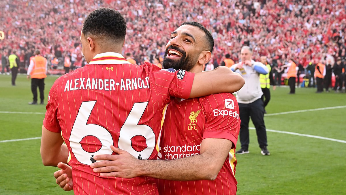 Mohamed Salah and Trent Alexander-Arnold celebrate Liverpool's title triumph