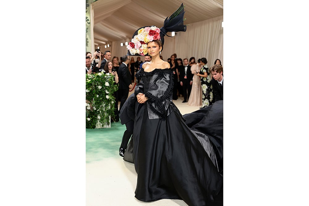 Zendayas floral headpiece and black vintage gown by John Galliano, 2024