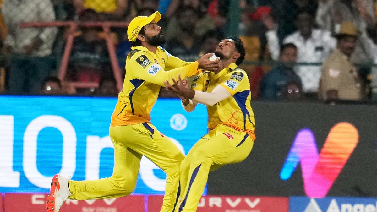 Chennai Super Kings Ravindra Jadeja, left, and teammate. AP