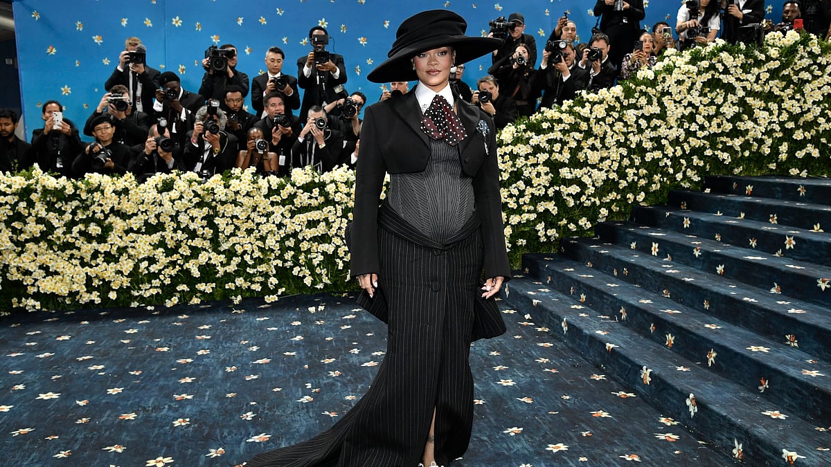 AP : Rihanna debuts baby bump on 2025 Met Gala 