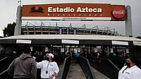 | Photo: AP/Eduardo Verdugo, : A fan gets his temperature checked as he enters Azteca Stadium before a Mexican soccer league quarterfinal second leg soccer match between Cruz Azul and Toluca in Mexico City, May 15, 2021. 