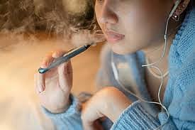A person using Vape