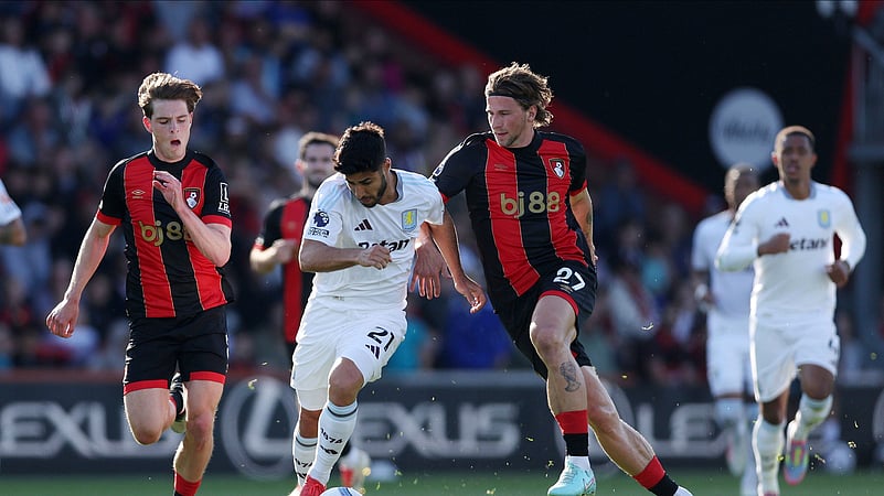 Aston Villas Marco Asensio, center left, and Bournemouths Illya Zabarnyi. AP Photo