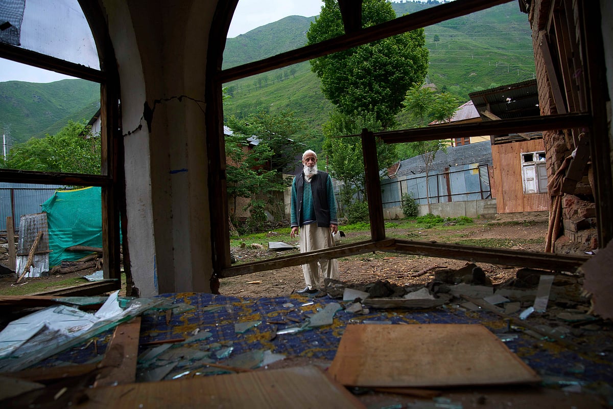 PTI : Damaged house after overnight Pakistan shelling