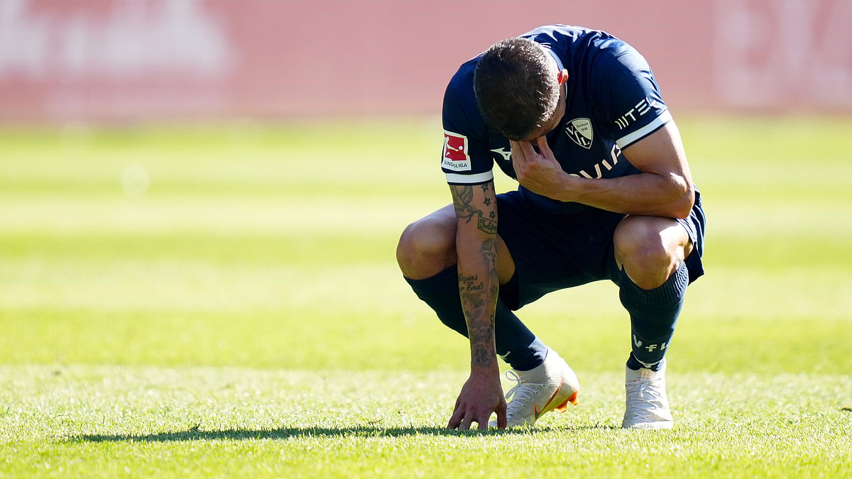 Cristian Gamboa looks distraught following Bochum's relegation