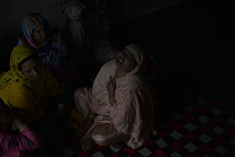 Family members of Nargis Begum at their Rajarwani home in North Kashmir’s Uri