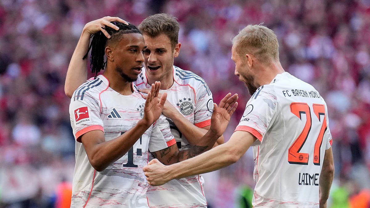 Michael Olise celebrates his goal against Borussia Monchengladbach