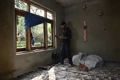s A damaged house in Salamabad area after incessant shelling from the Pakistani side
