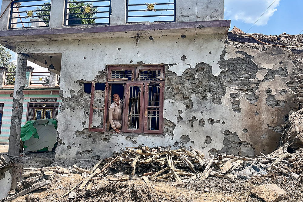 | Photo: PTI : Indo-Pak Conflict: Damaged house after cross border shelling in Poonch