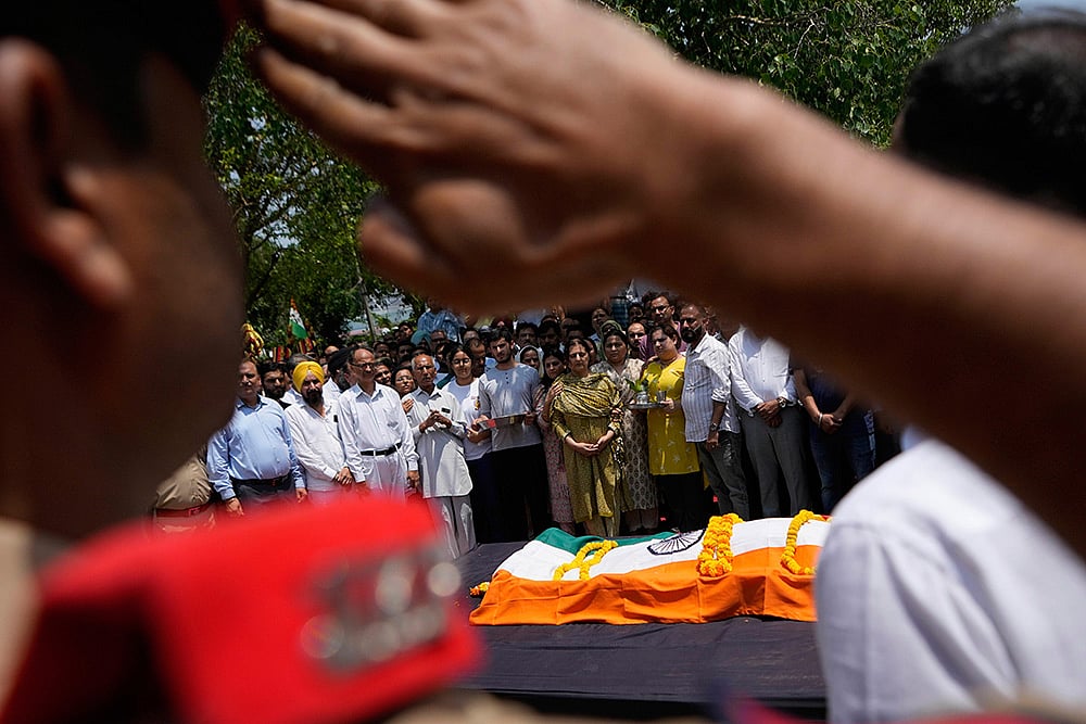 Police personnel pay tribute to Raj Thapa