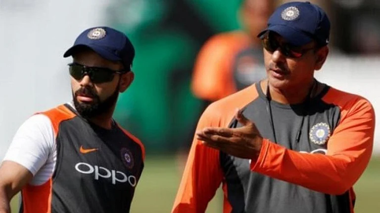 Ravi Shastri with Virat Kohli. - File