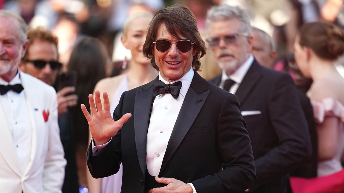 (Photo by Scott A Garfitt/Invision/AP) : Tom Cruise poses for photographers upon arrival at the premiere of the film 'Mission: Impossible - The Final Reckoning' at the 78th international film festival, Cannes, southern France, Wednesday, May 14, 2025. 