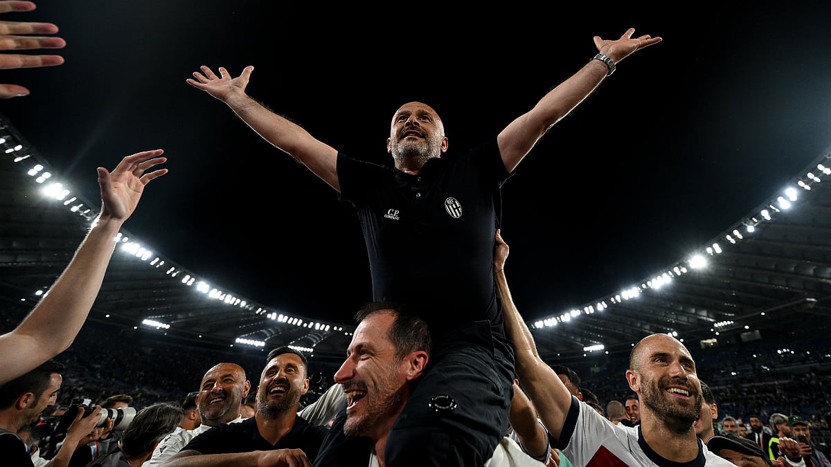Vincenzo Italiano takes in the celebration at full-time on Wednesday. - File
