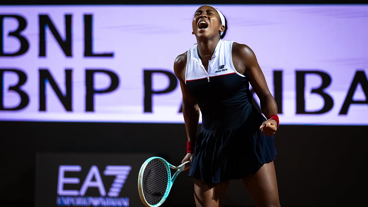 Coco Gauff roars after beating Qinwen Zheng.