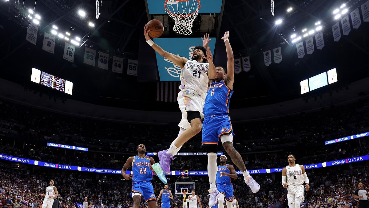 Jamal Murray #27 of the Denver Nuggets drives to the basket against Jaylin Williams #6 of the Oklahoma City Thunder in Game Six of the Western Conference Second Round NBA Playoffs at Ball Arena on May 15, 2025 in Denver, Colorado. - null