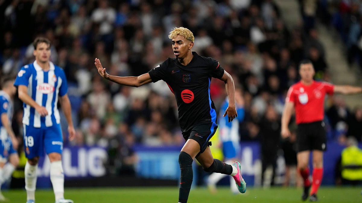 FC Barcelona's Lamine Yamal reacts after scoring the opener against Espanyol during their Spanish La Liga 2024-25 match at RCDE Stadium on May 15, 2025. - AP/Jose Breton