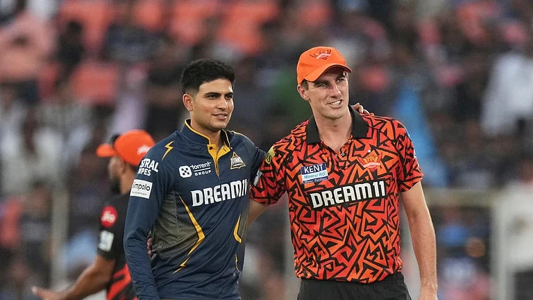 Gujarat Titans' captain Shubman Gill, left, and Sunrisers Hyderabad's captain Pat Cummins before the Indian Premier League cricket match. - AP