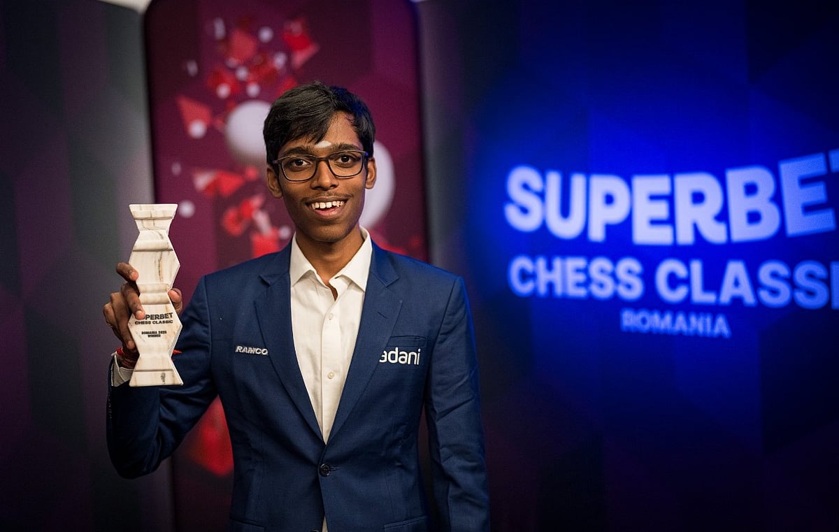 X : GM R. Praggnanandhaa poses with the  Superbet Chess Classic 2025 title