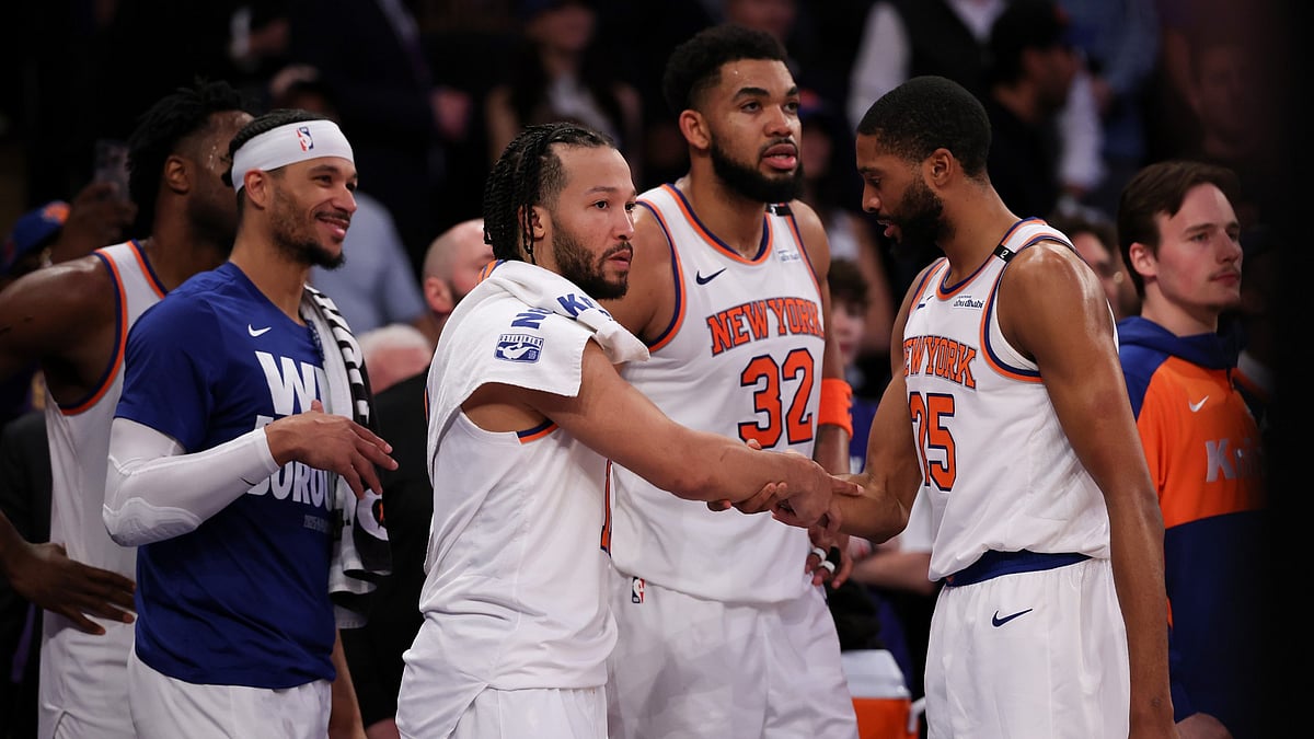 Jalen Brunson #11 of the New York Knicks congratulates Mikal Bridges #25 of the New York Knicks during the fourth quarter against the Boston Celtics in Game Six of the Eastern Conference Second Round NBA Playoffs at Madison Square Garden on May 16, 2025 in New York City.