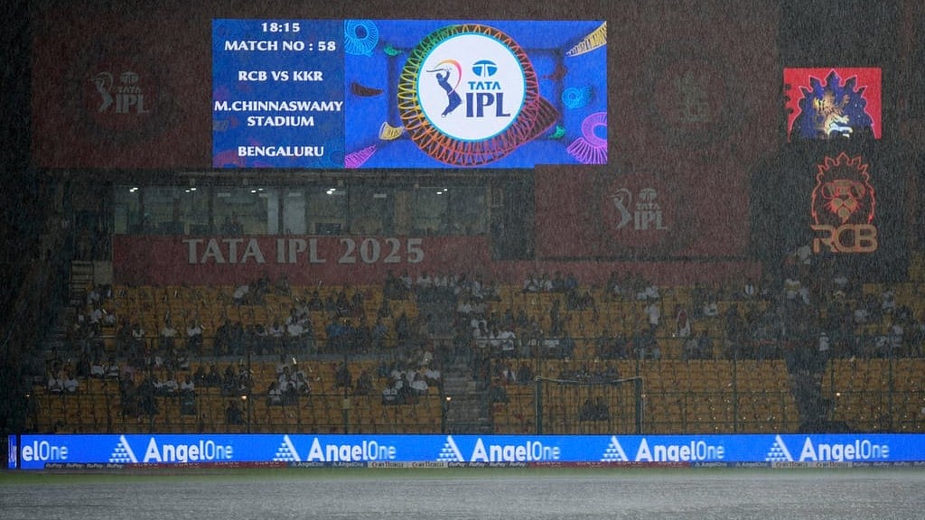 A digital sign displays match details as It rains heavily shortly before the scheduled start of the Indian Premier League cricket match between Kolkata Knight Riders and Royal Challengers Bengaluru at Chinnaswamy Stadium in Bengaluru, India, Saturday, May 17, 2025.
 - AP/Aijaz Rahi