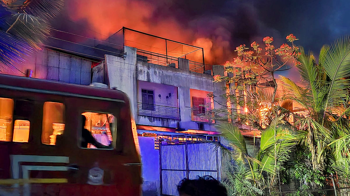 Smoke billows after a fire broke out at a factory, at MIDC area