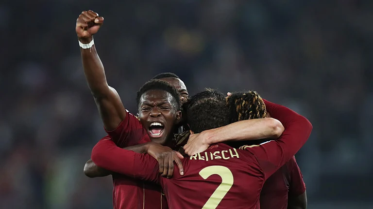 Roma celebrate their win over AC Milan. - File