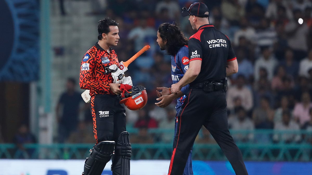 The umpire walks to intervene as Sunrisers Hyderabad's Abhishek Sharma, left, interacts with Lucknow Super Giants' Digvesh Rathi after Sharma lost his wicket during the Indian Premier League cricket match between Lucknow Super Giants and Sunrisers Hyderabad at Atal Bihari Vajpayee Ekana Cricket Stadium in Lucknow, India, Monday, May 19, 2025. 

 - (AP Photo)