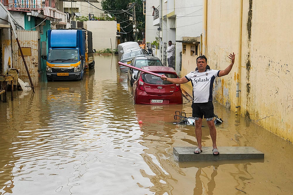 Bengaluru weather Heavy Rain 100mm Rainfall Floods the City
